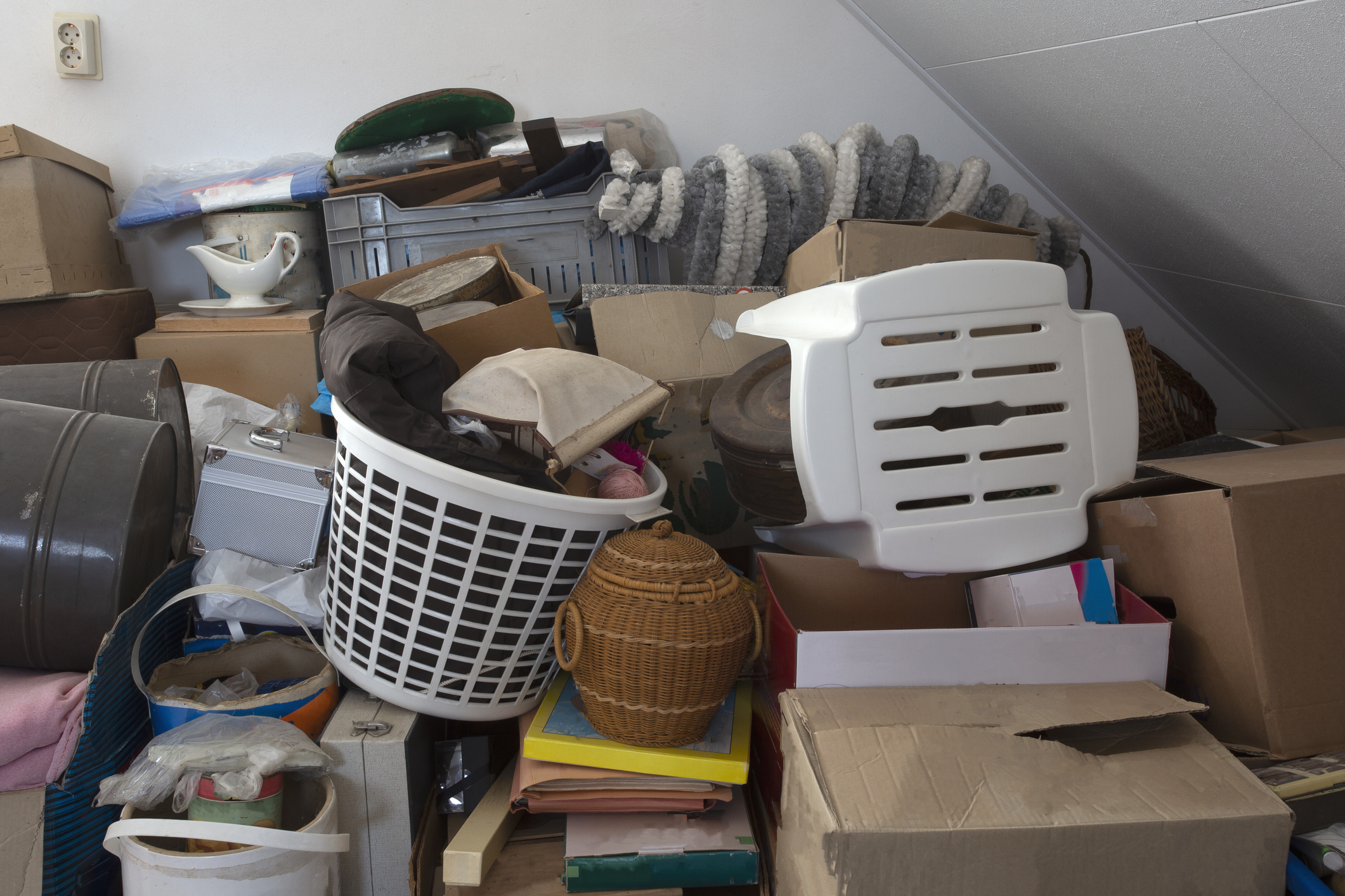 Pile of junk in a house, hoarder room pile of household equipment needs clearing out household junk the junk men