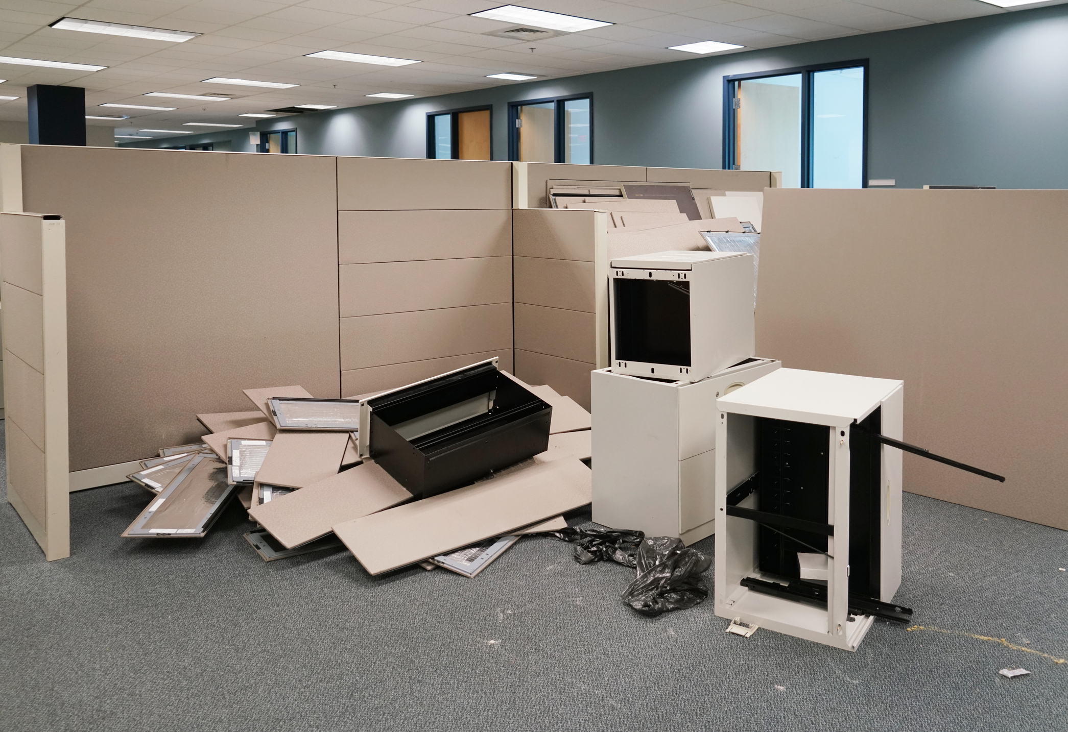 office interior during renovation with furniture removing commercial rubbish clear outs the junk men