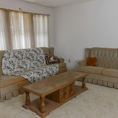 Vintage couches and coffee table left forgotten in an abandoned house deceased estate clear outs the junk men