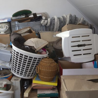 Pile of junk in a house, hoarder room pile of household equipment needs clearing out household junk the junk men